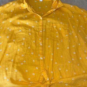 Gold button up blouse.